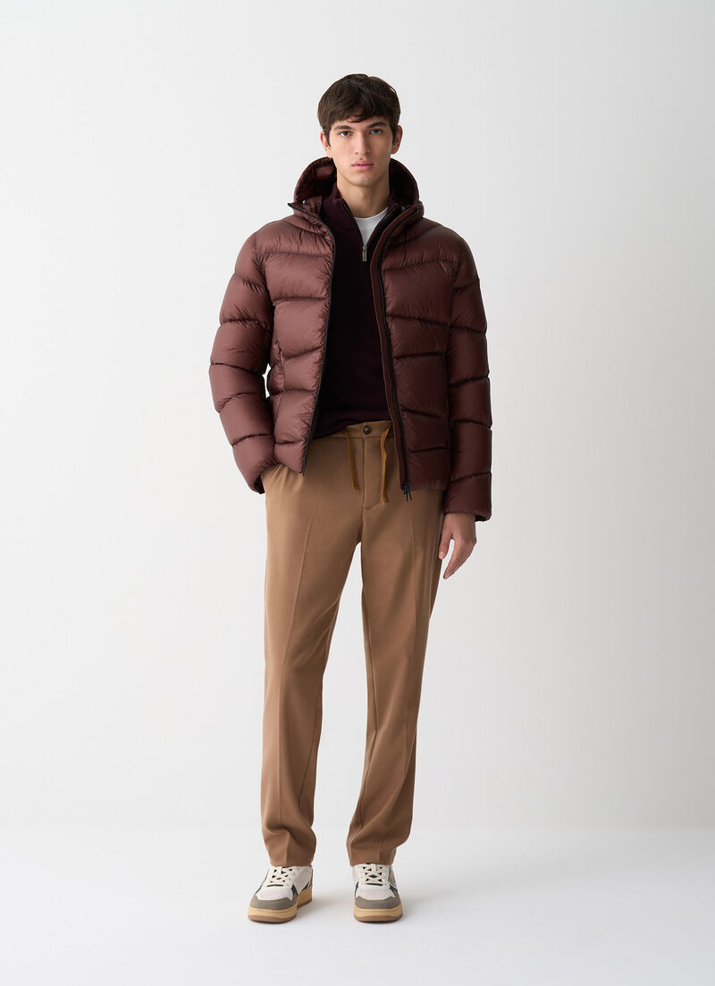 Hooded down jacket with wavy quilting