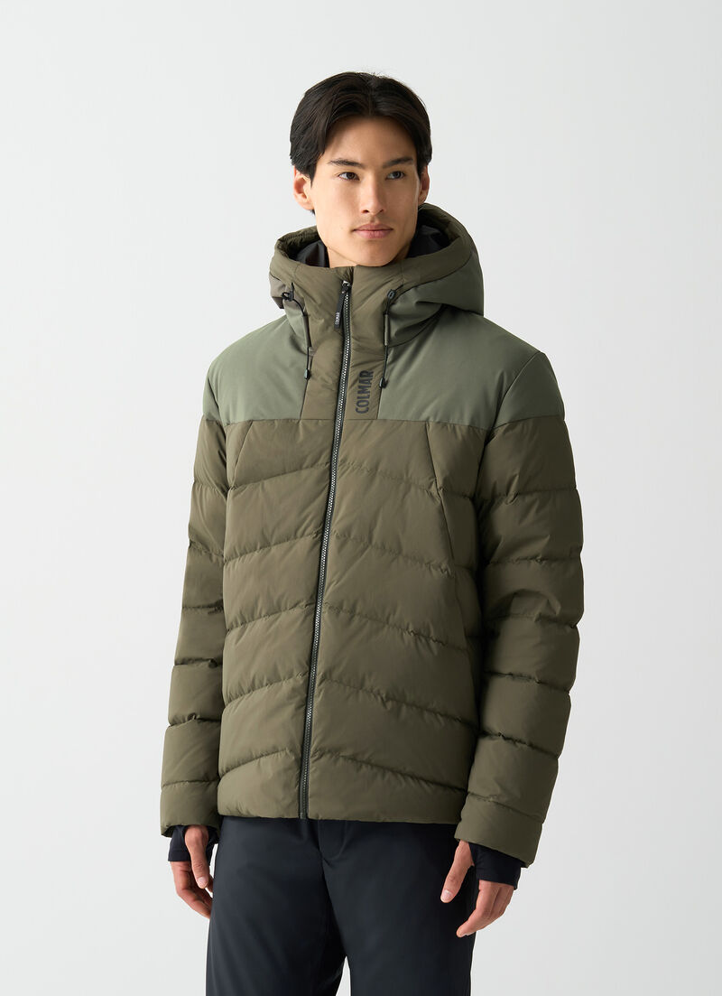 Ski gloves with stretch inserts