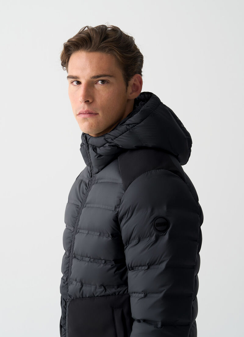 Seamless quilted down jacket with smooth inserts
