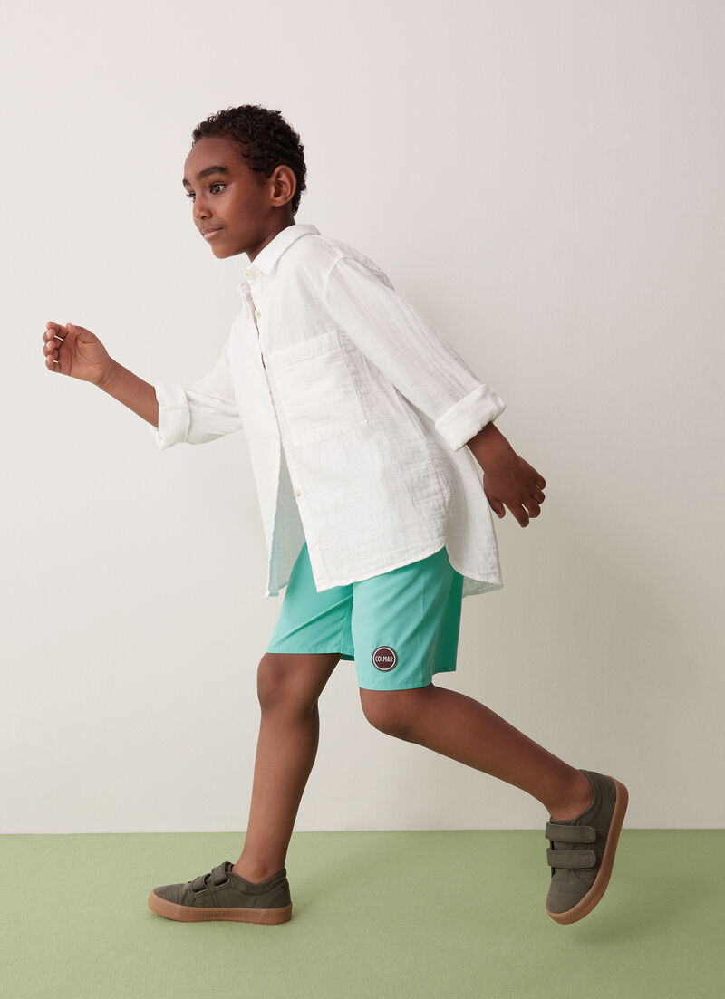 Solid colour swimsuit with elasticated waist