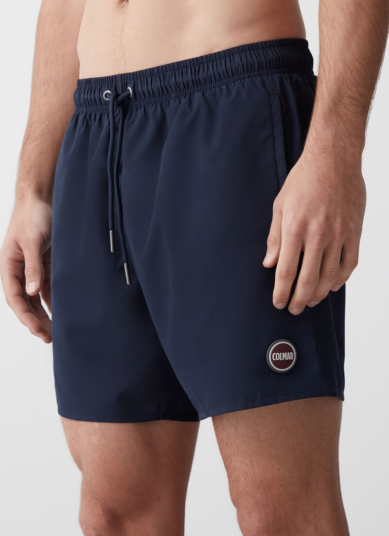 Solid colour swimsuit with elasticated waist