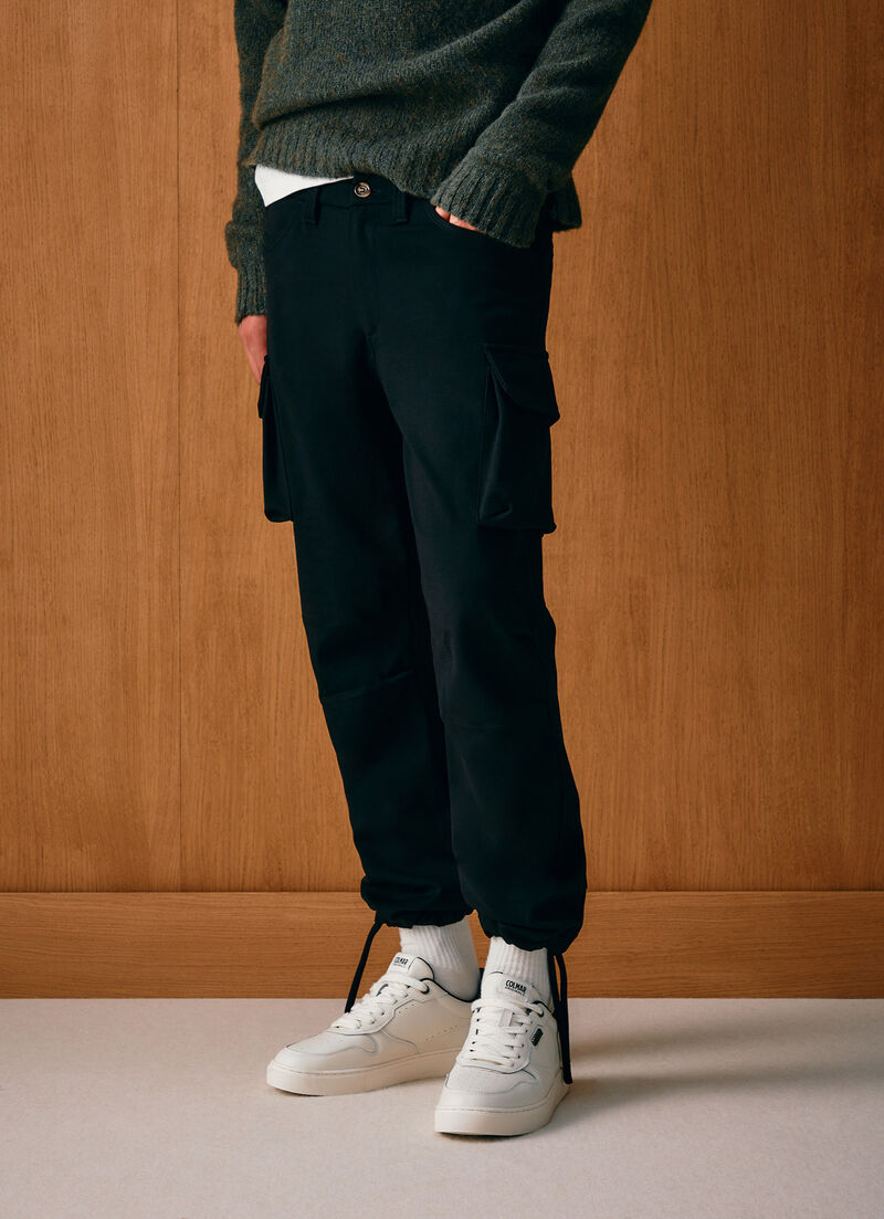 Interlock trousers with maxi pockets