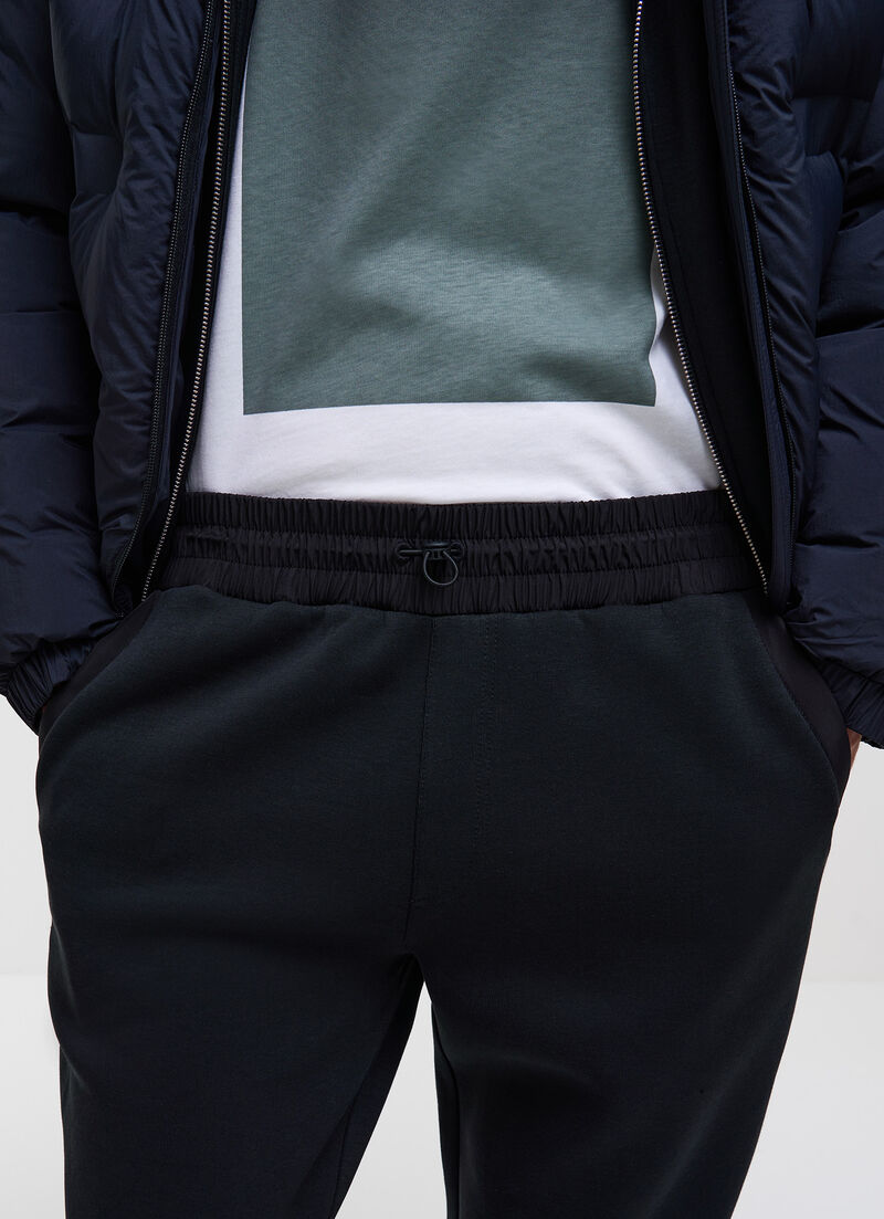 Tracksuit bottoms with nylon inserts