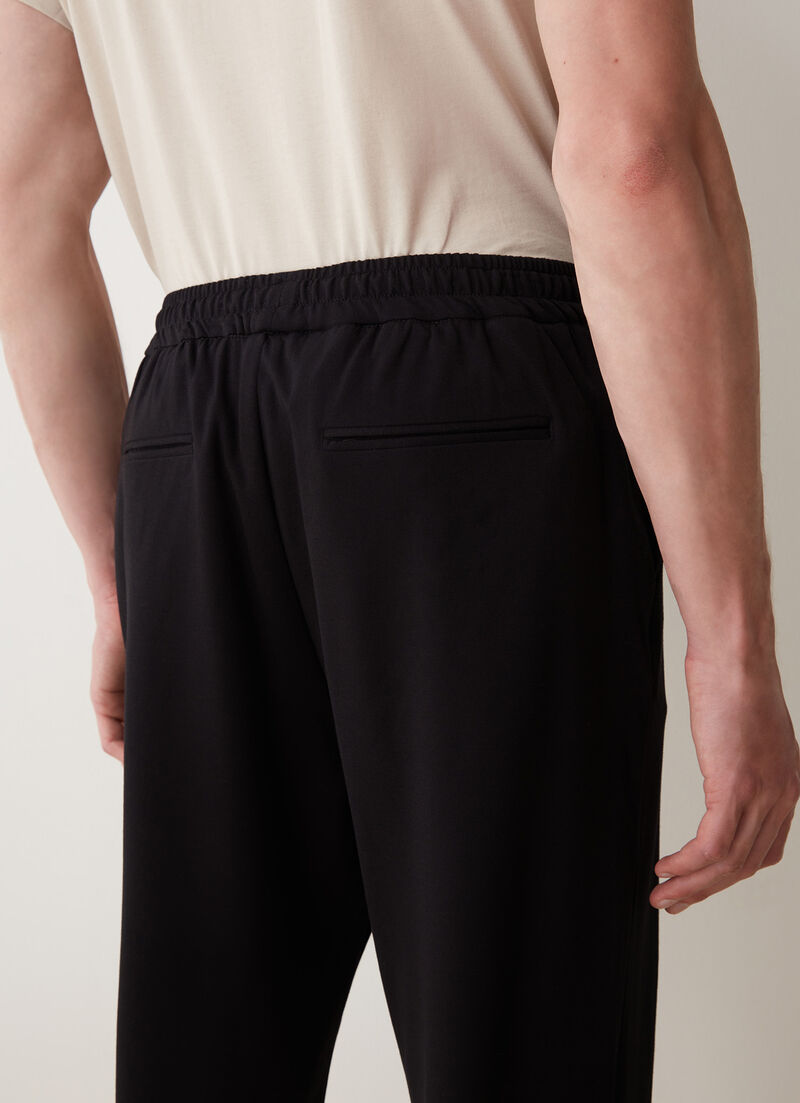 Comfortable-cut trousers with elasticated waistband