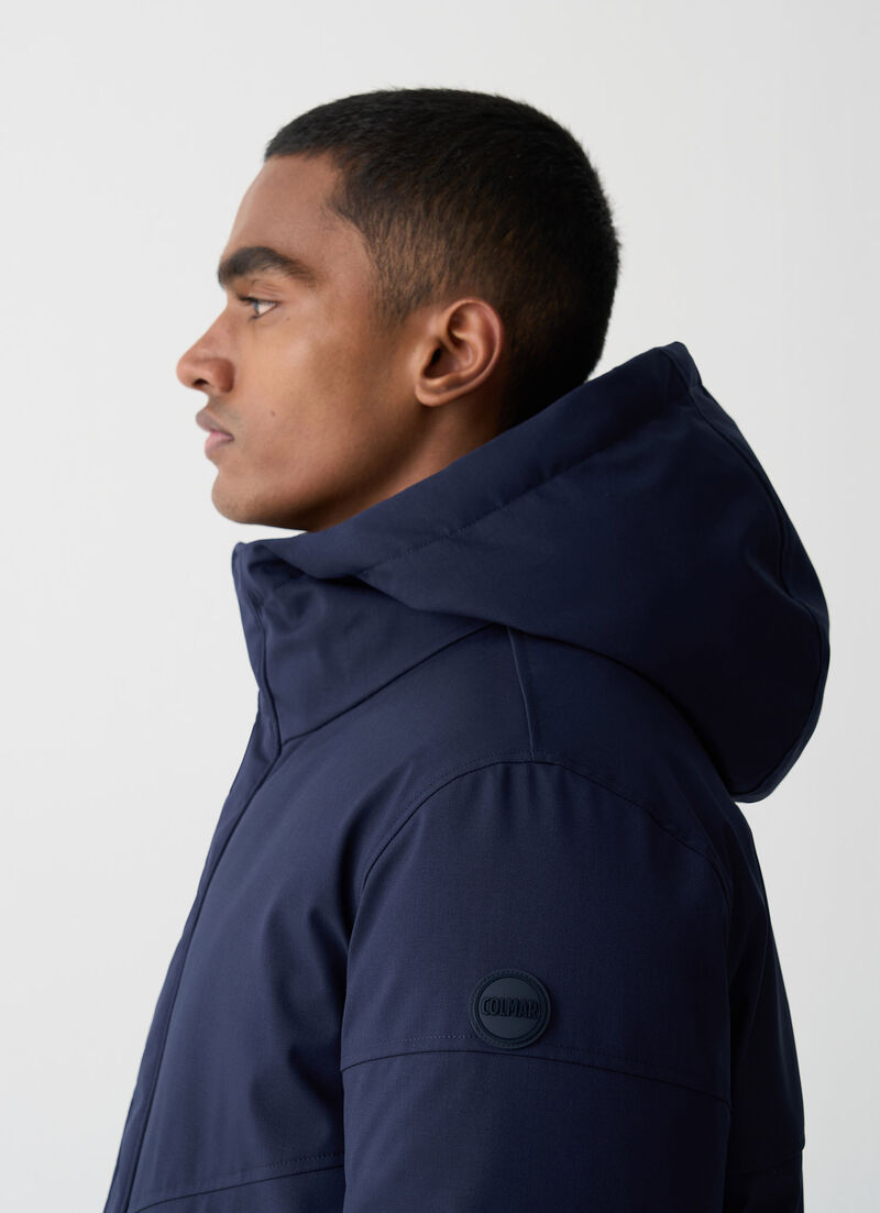 Long twill down jacket with patch pockets.