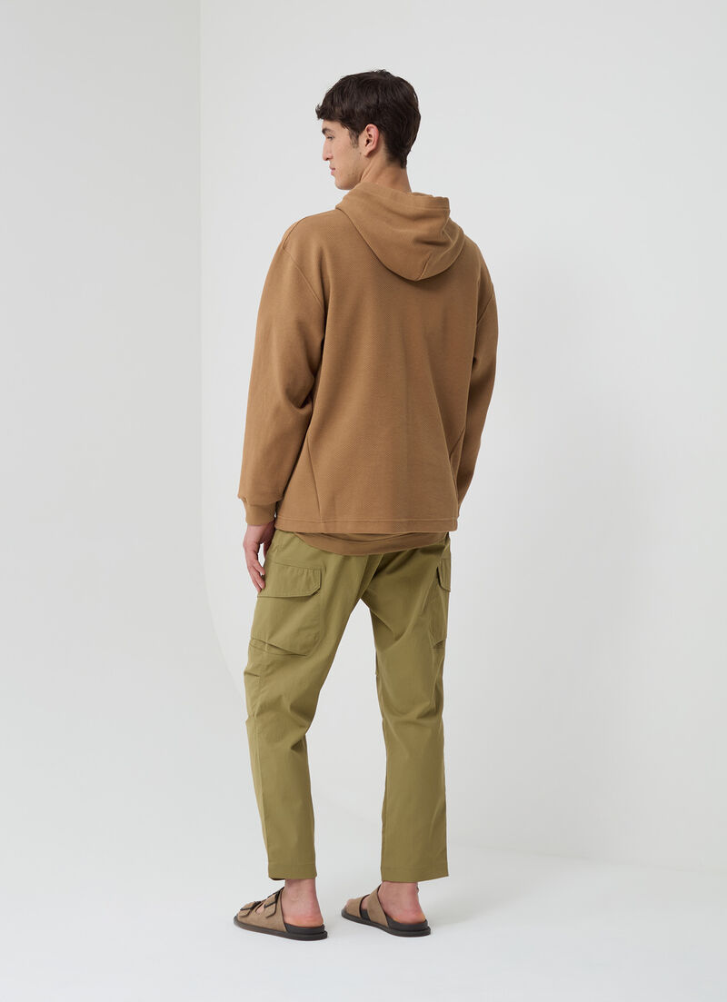 Sweatshirt with slanted nylon pocket