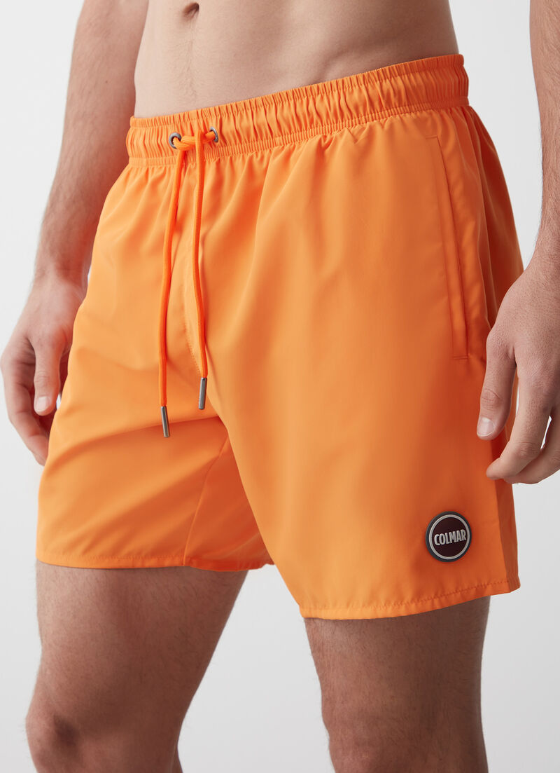 Solid colour swimsuit with elasticated waist