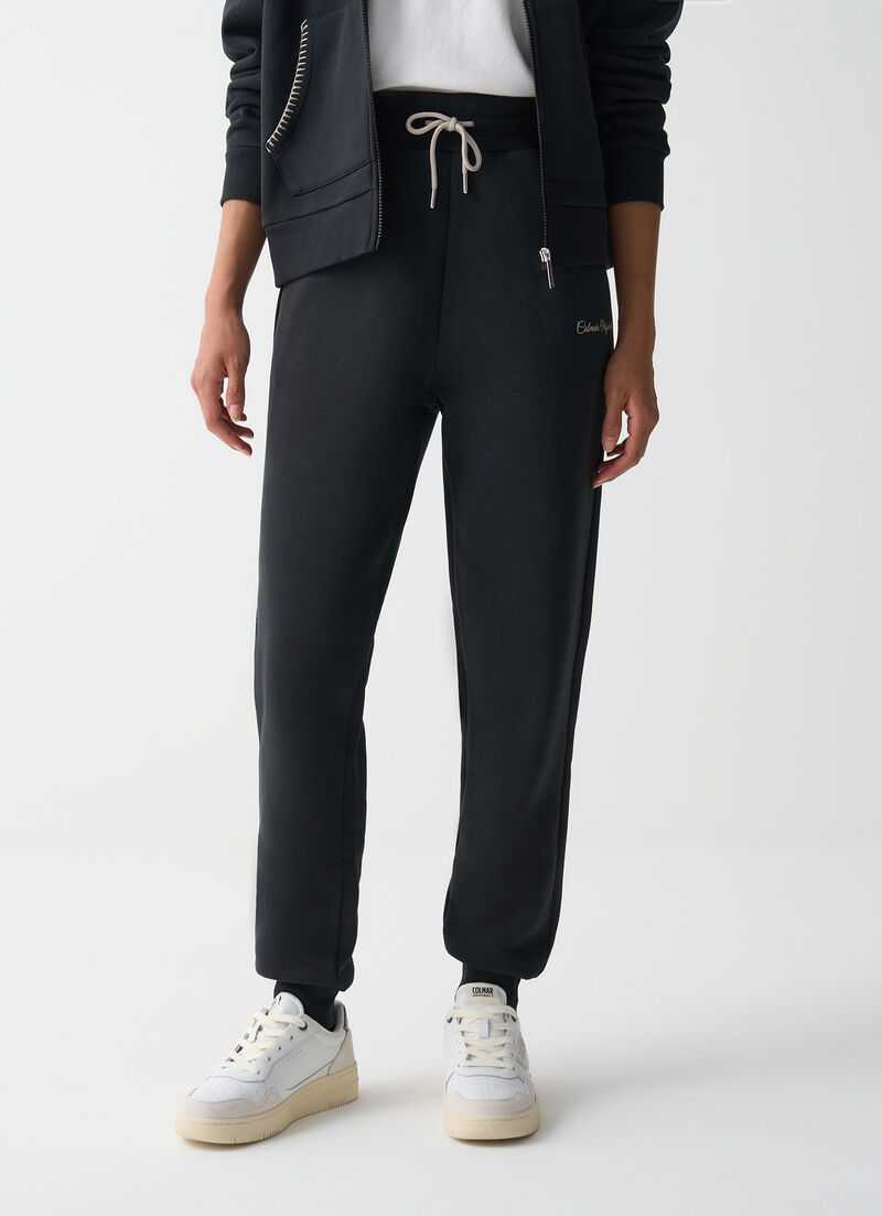 Tracksuit bottoms with embroidery