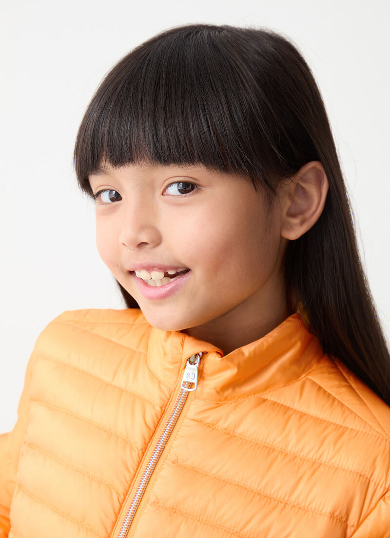 Down jacket with rounded hem