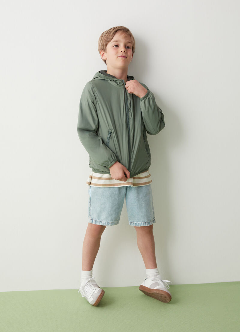 Reversible jacket with hood