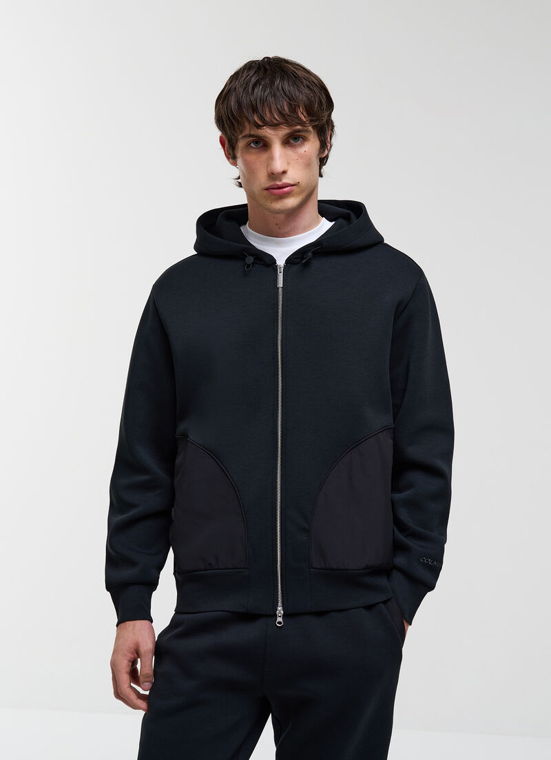 Hooded sweatshirt with nylon inserts