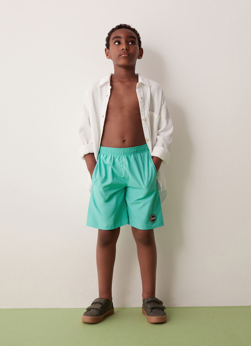 Solid colour swimsuit with elasticated waist