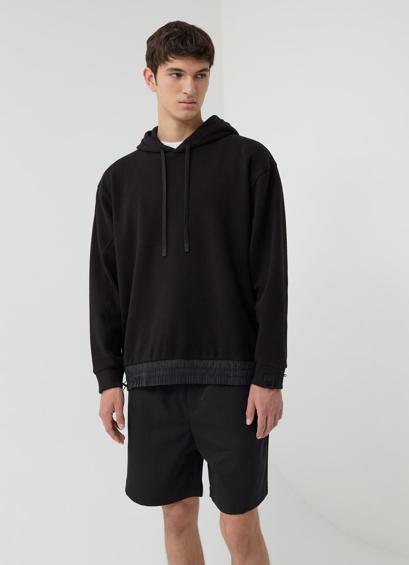 Sweatshirt with nylon inserts