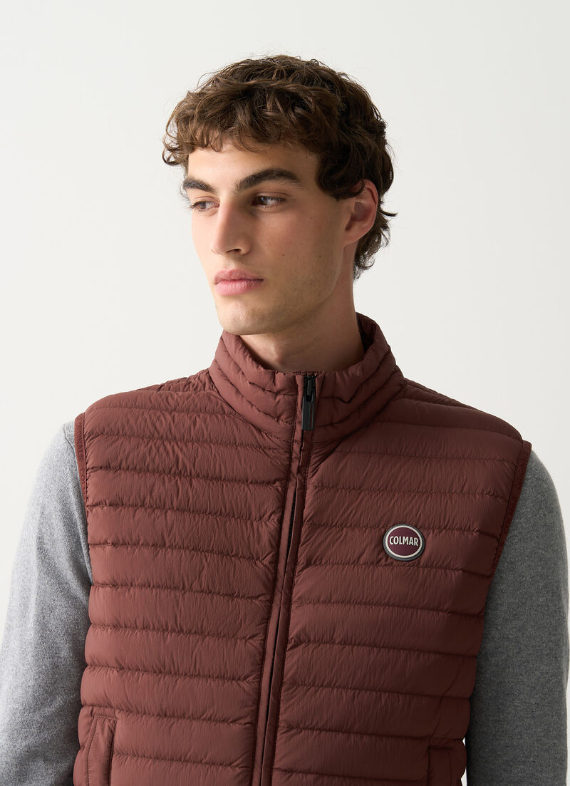 Light down vest with drawstring