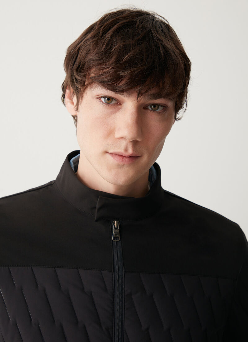 Padded biker jacket with ultrasonic stitching