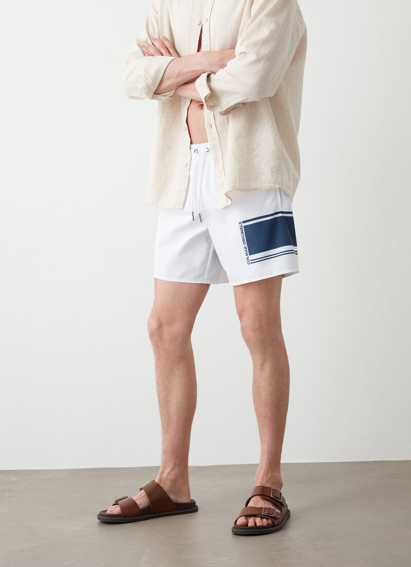 Swimsuit with interblock print