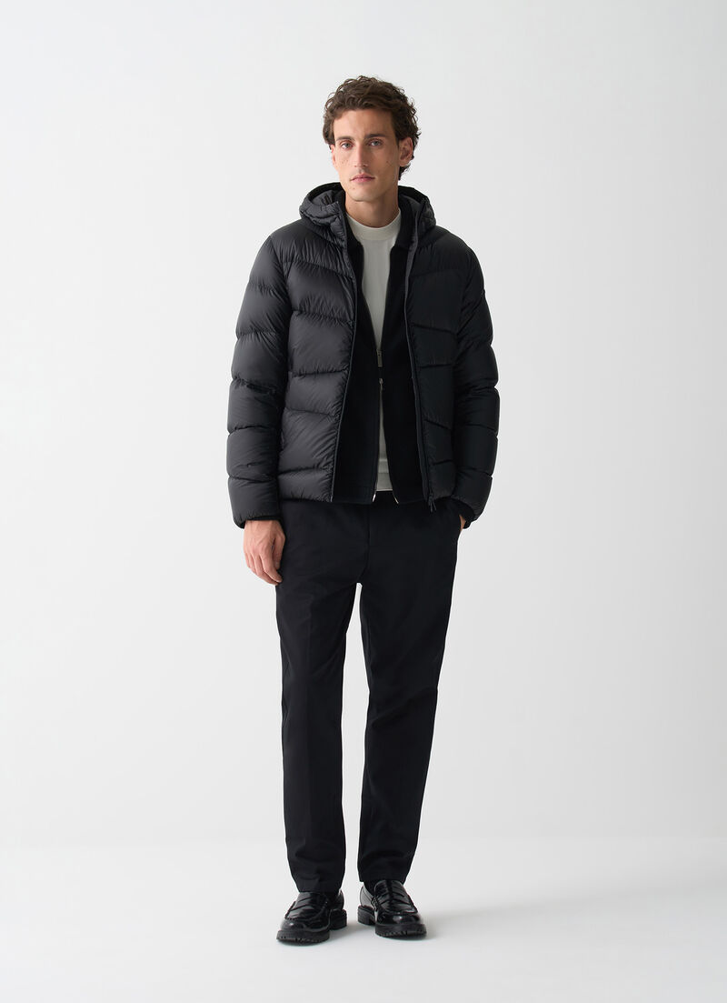 Hooded down jacket with wavy quilting