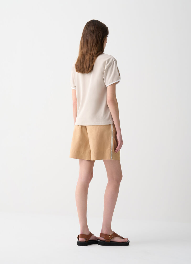 Polo-shirt with rounded sleeves