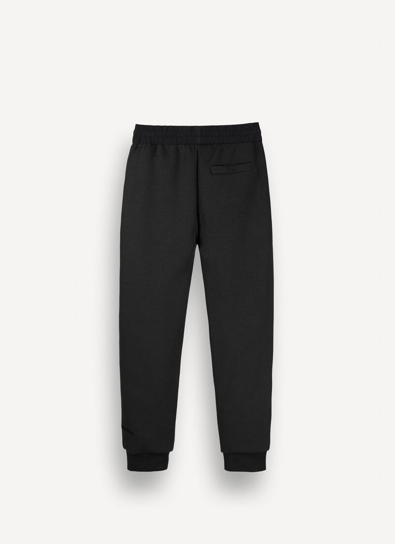 Tracksuit bottoms with nylon inserts