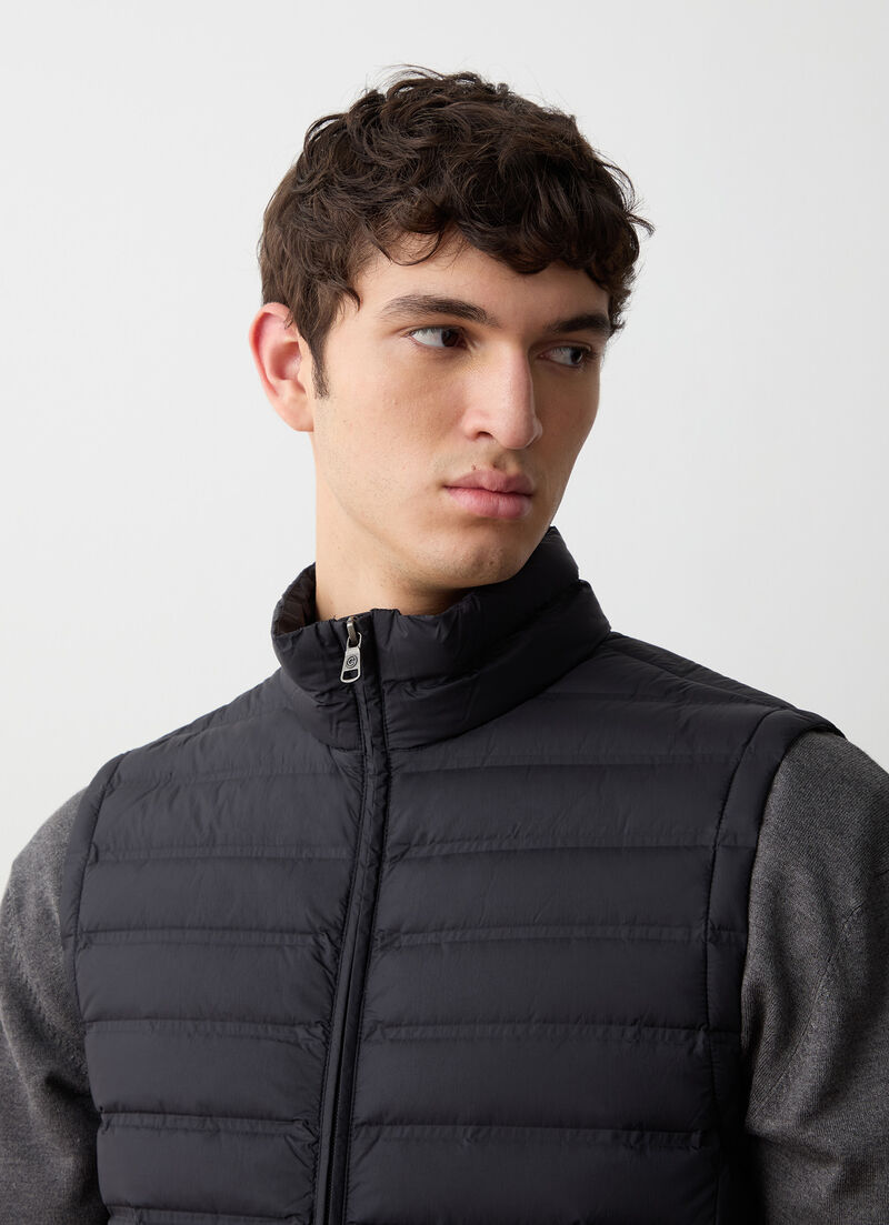 Down vest with seamless quilting