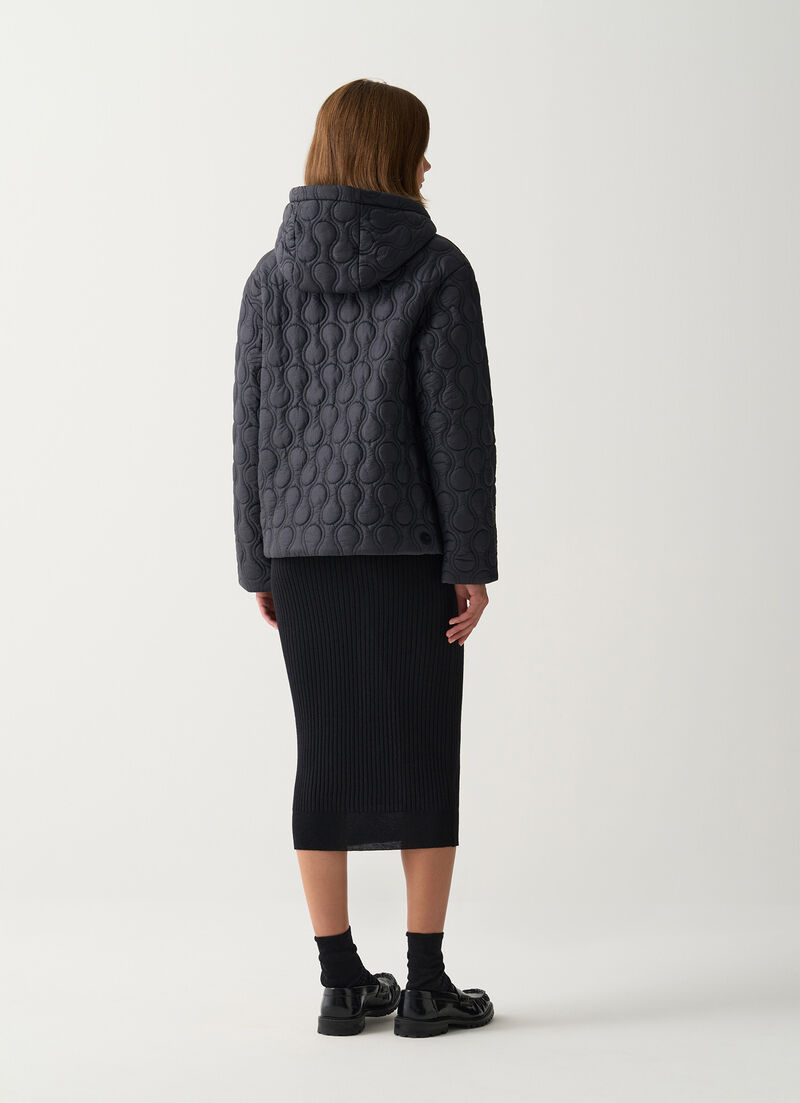 Light teardrop-quilted jacket.