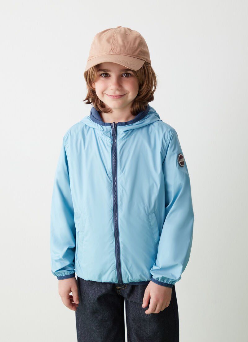 Reversible jacket with hood