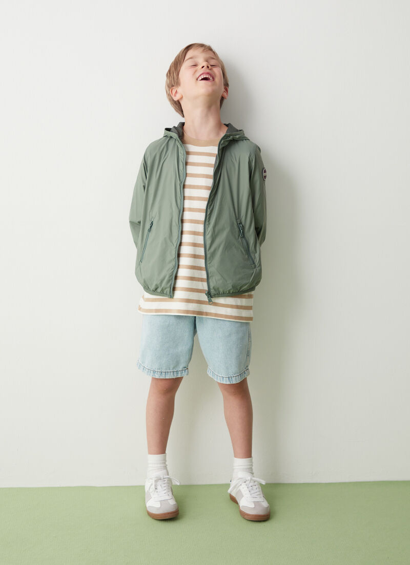 Reversible jacket with hood