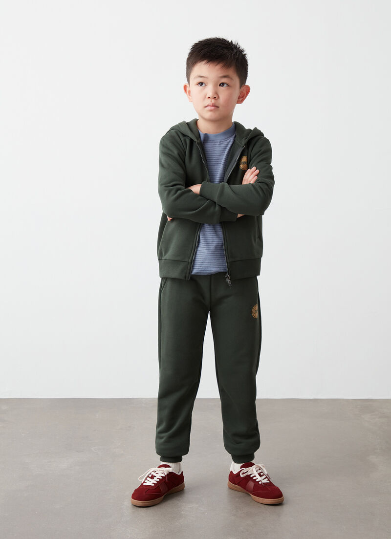 Tracksuit bottoms with camouflage logo