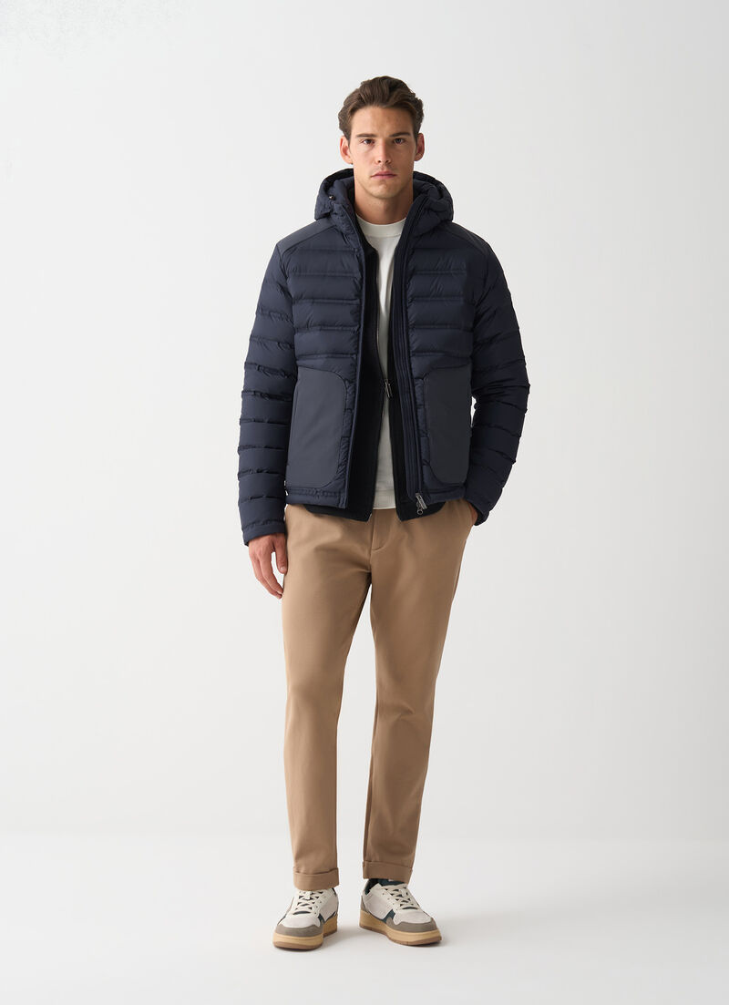 Seamless quilted down jacket with smooth inserts