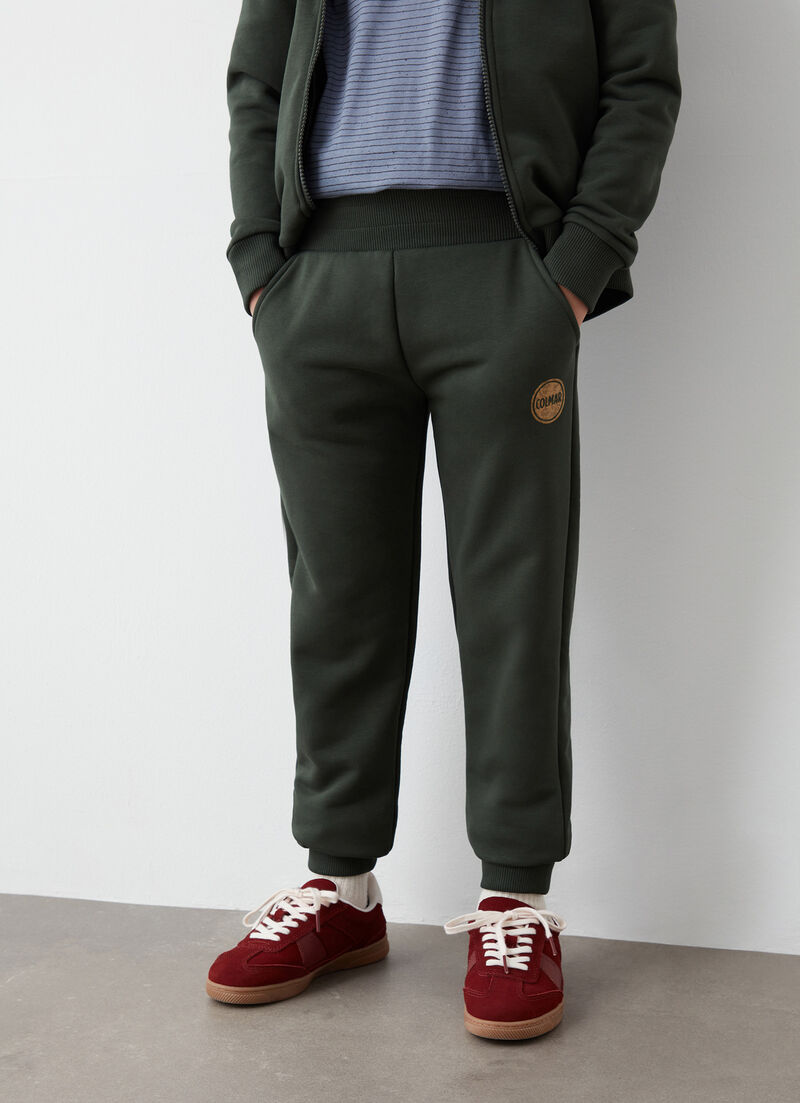 Tracksuit bottoms with camouflage logo