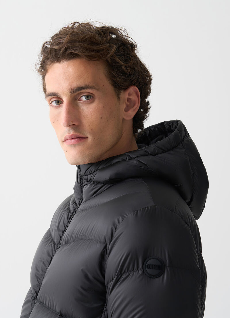 Hooded down jacket with wavy quilting