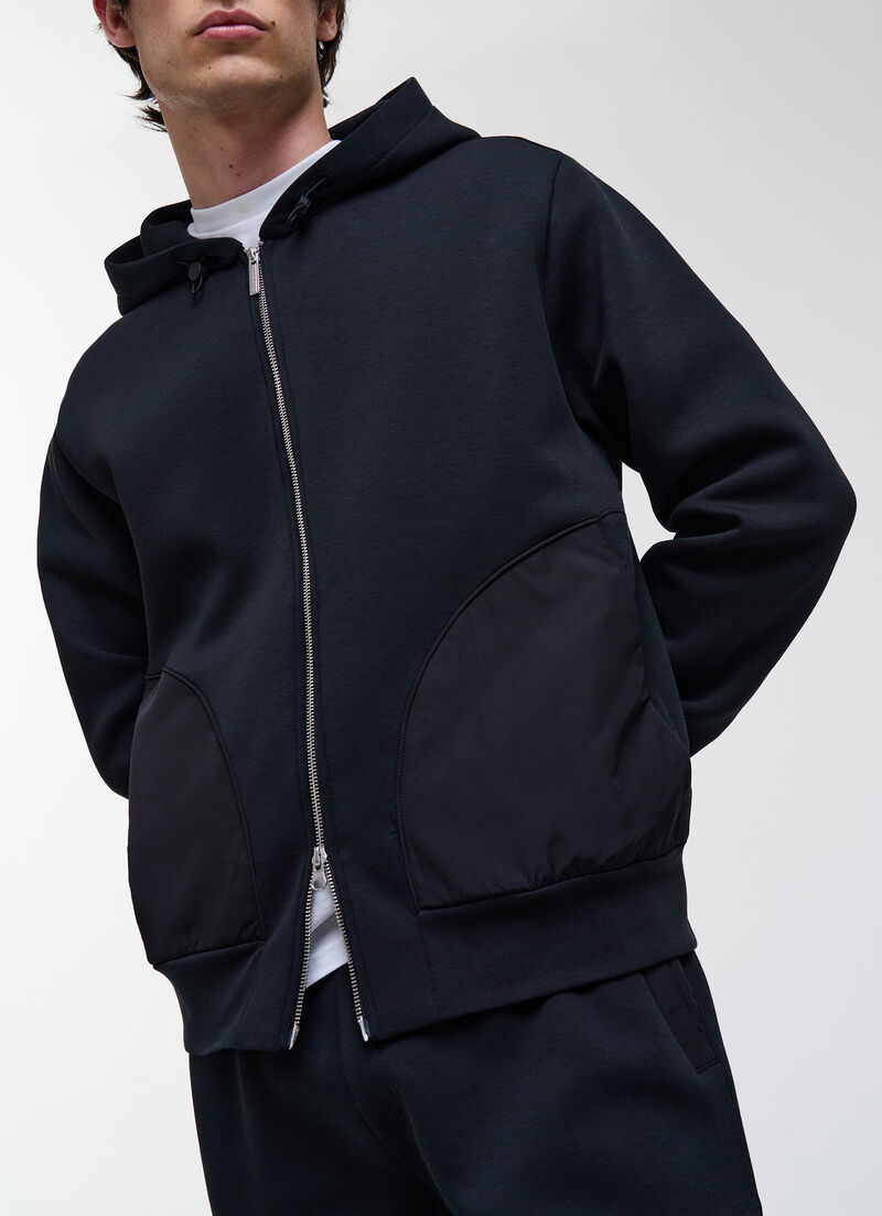 Hooded sweatshirt with nylon inserts