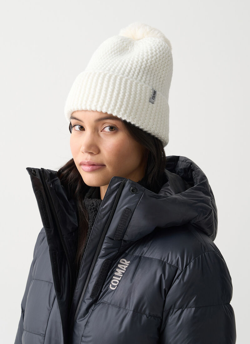 Women's hat with faux fur pom-pom