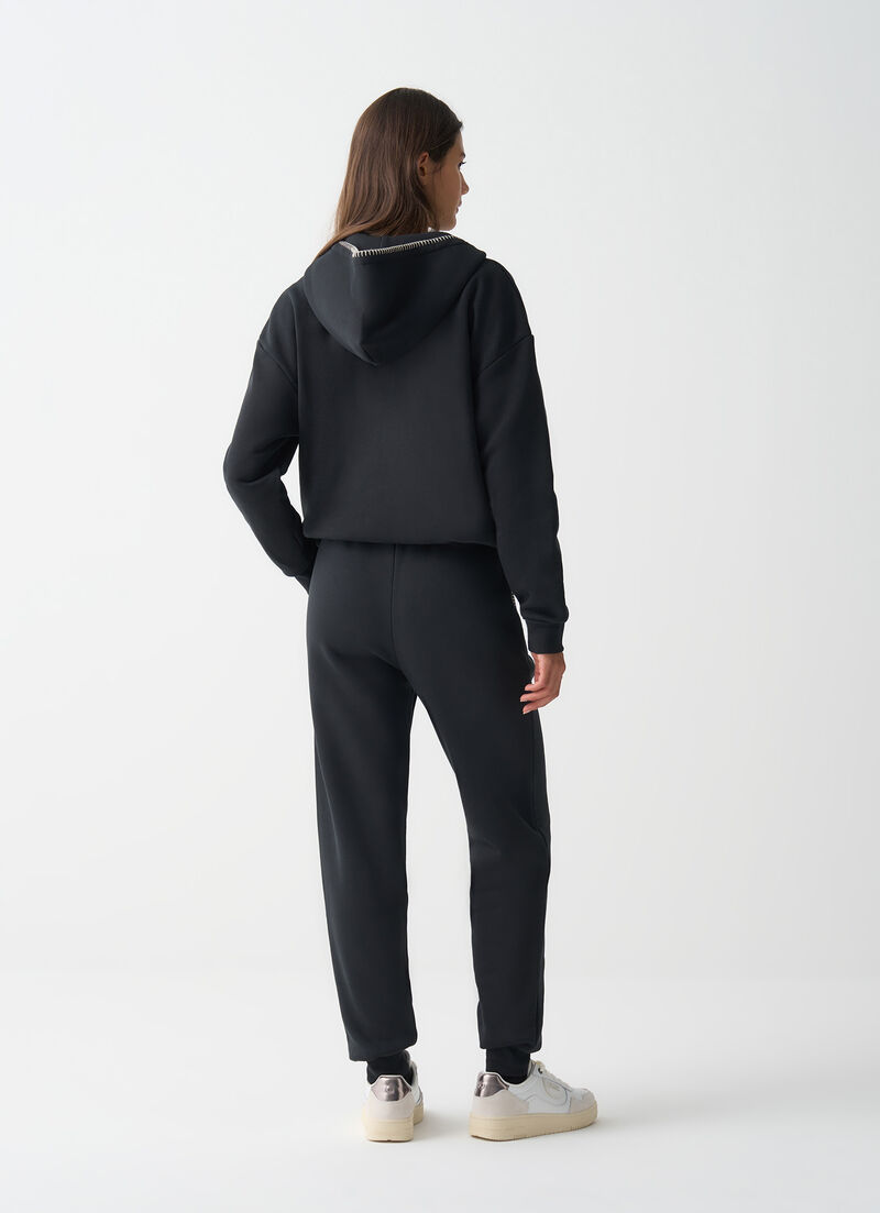 Tracksuit bottoms with embroidery