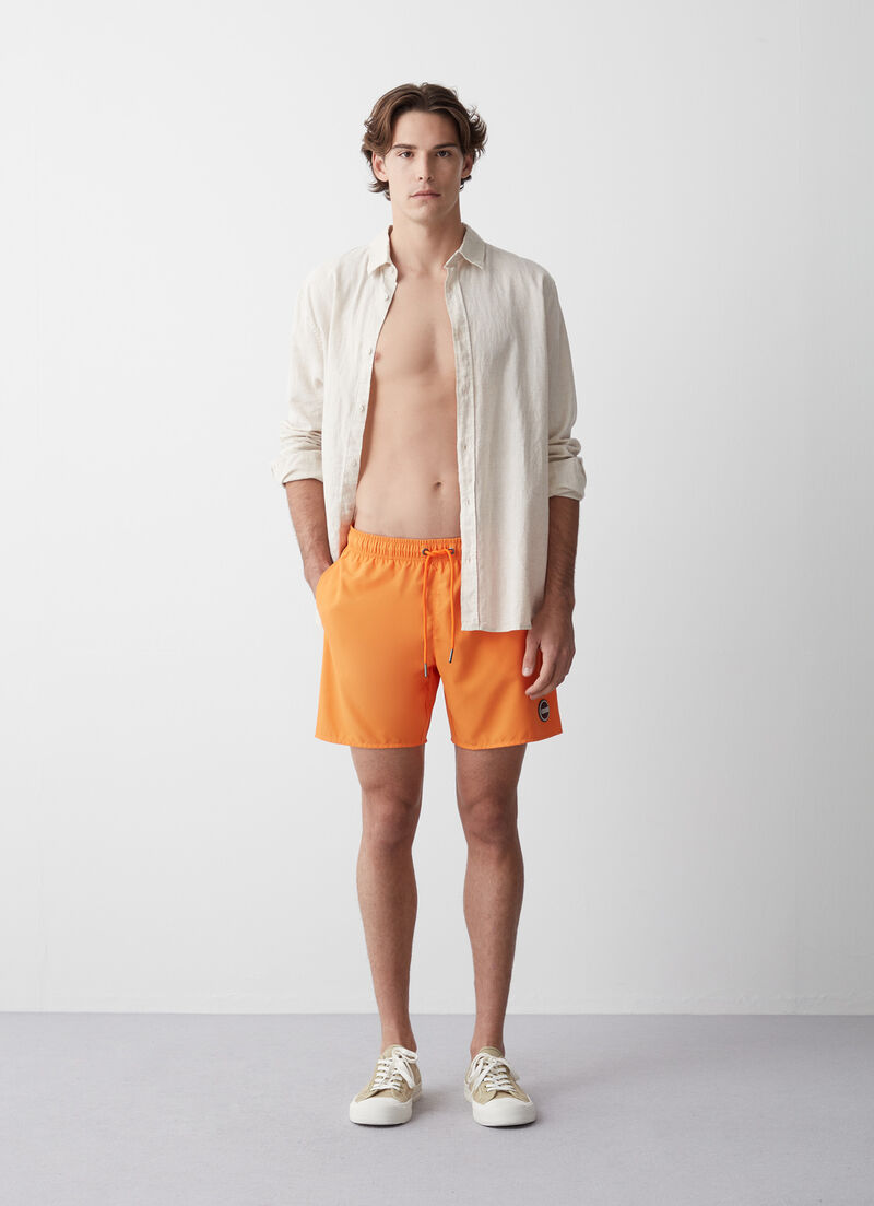 Solid colour swimsuit with elasticated waist