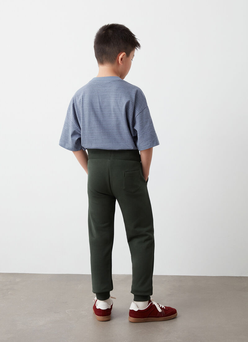 Tracksuit bottoms with camouflage logo