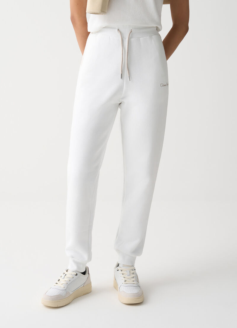 Tracksuit bottoms with embroidery