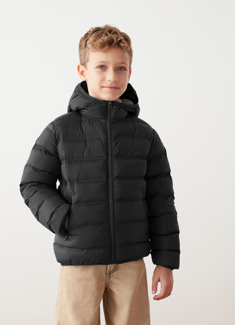 Down jacket with seamless quilting