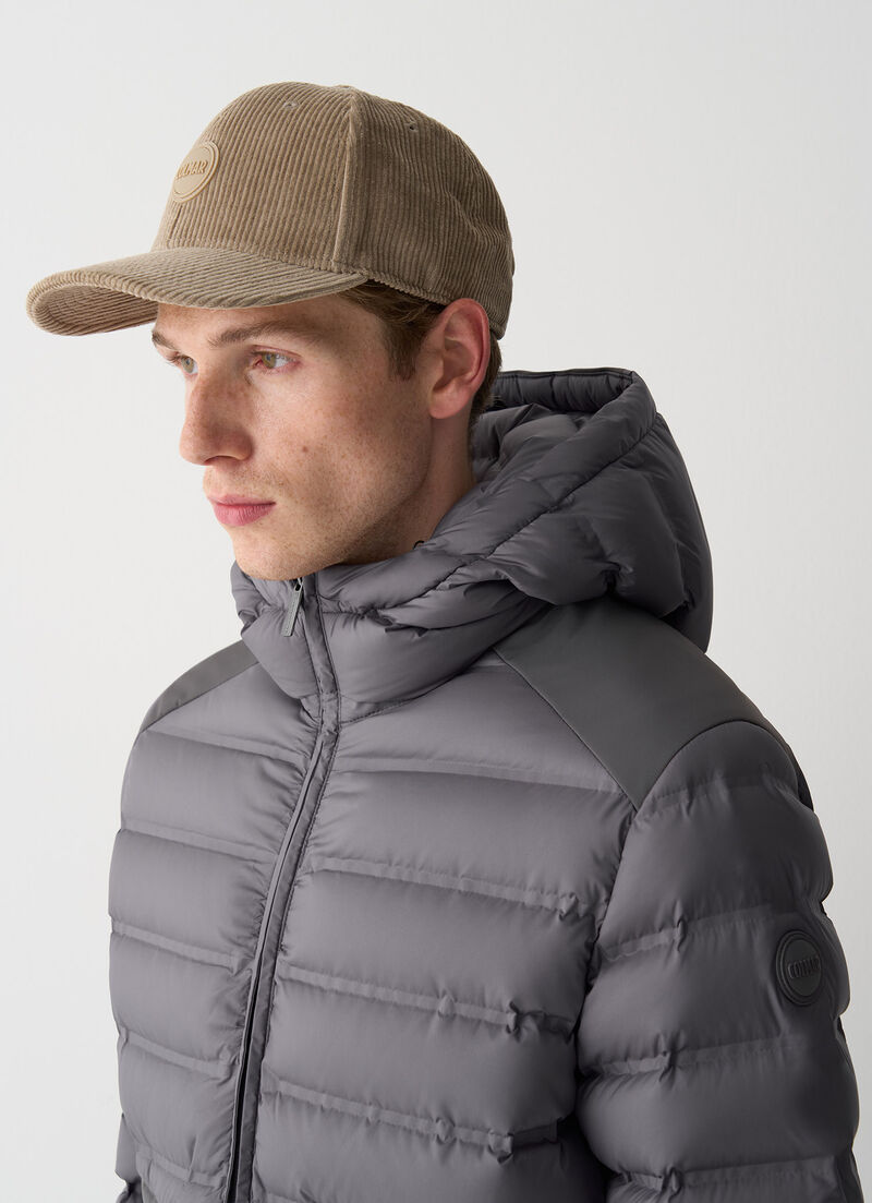 Seamless quilted down jacket with smooth inserts