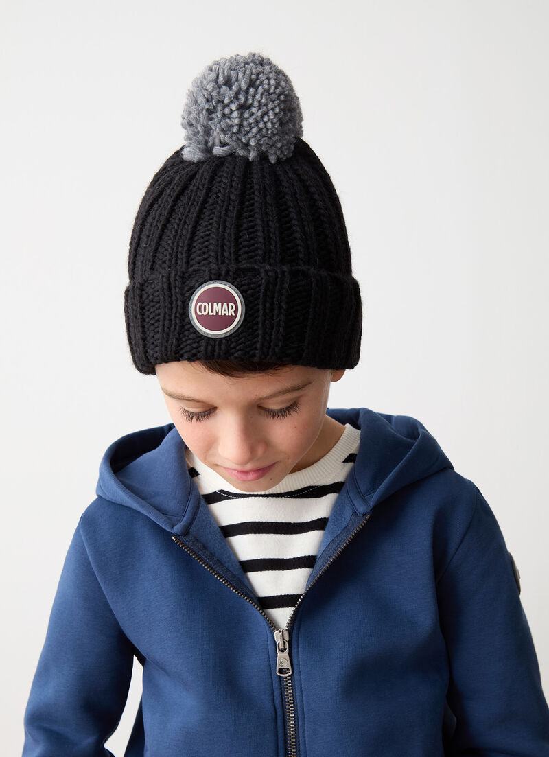 Unisex cap with pom-pom