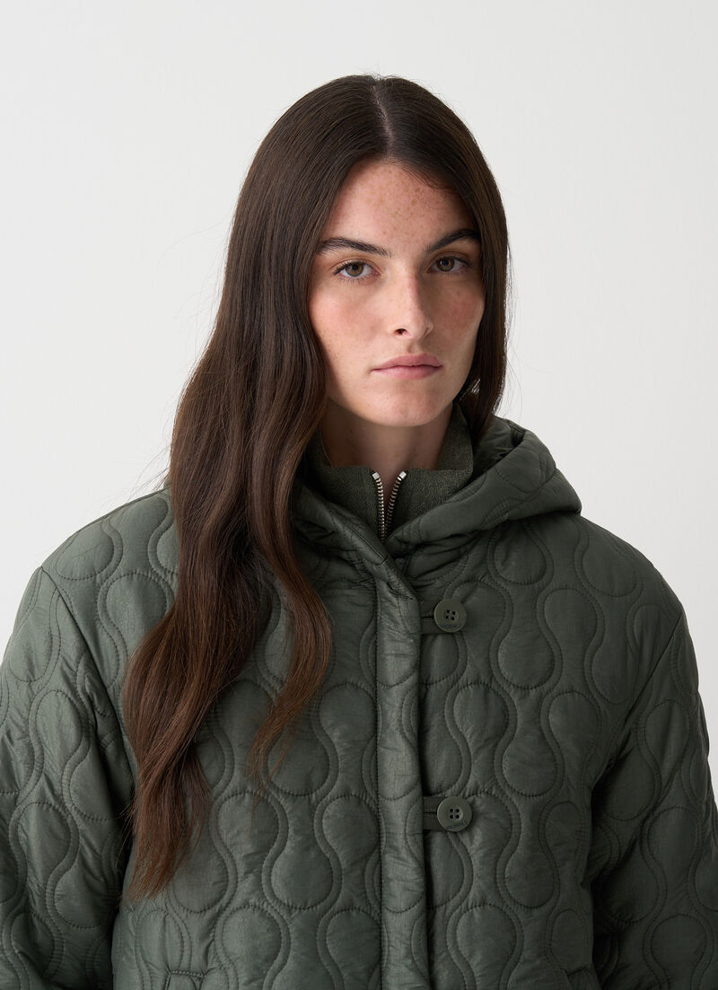 Light teardrop-quilted jacket.
