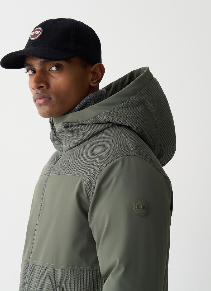 Bi-material hooded down jacket