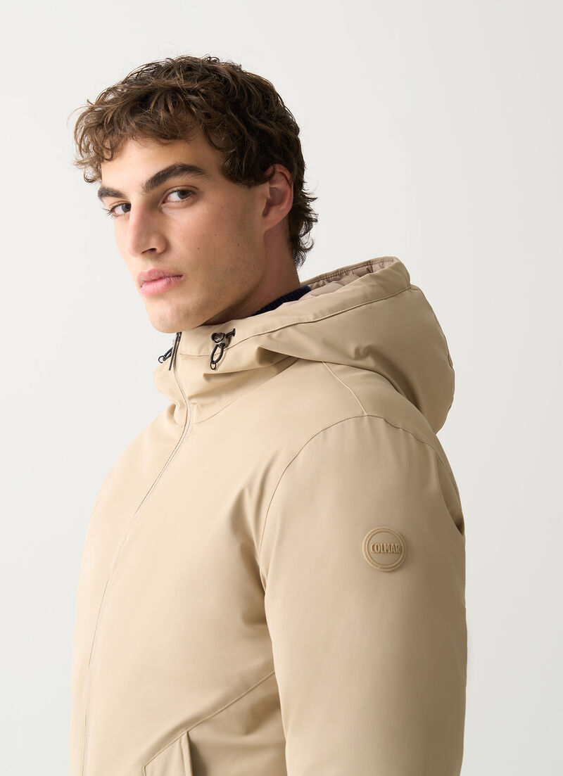 Reversible waterproof down jacket