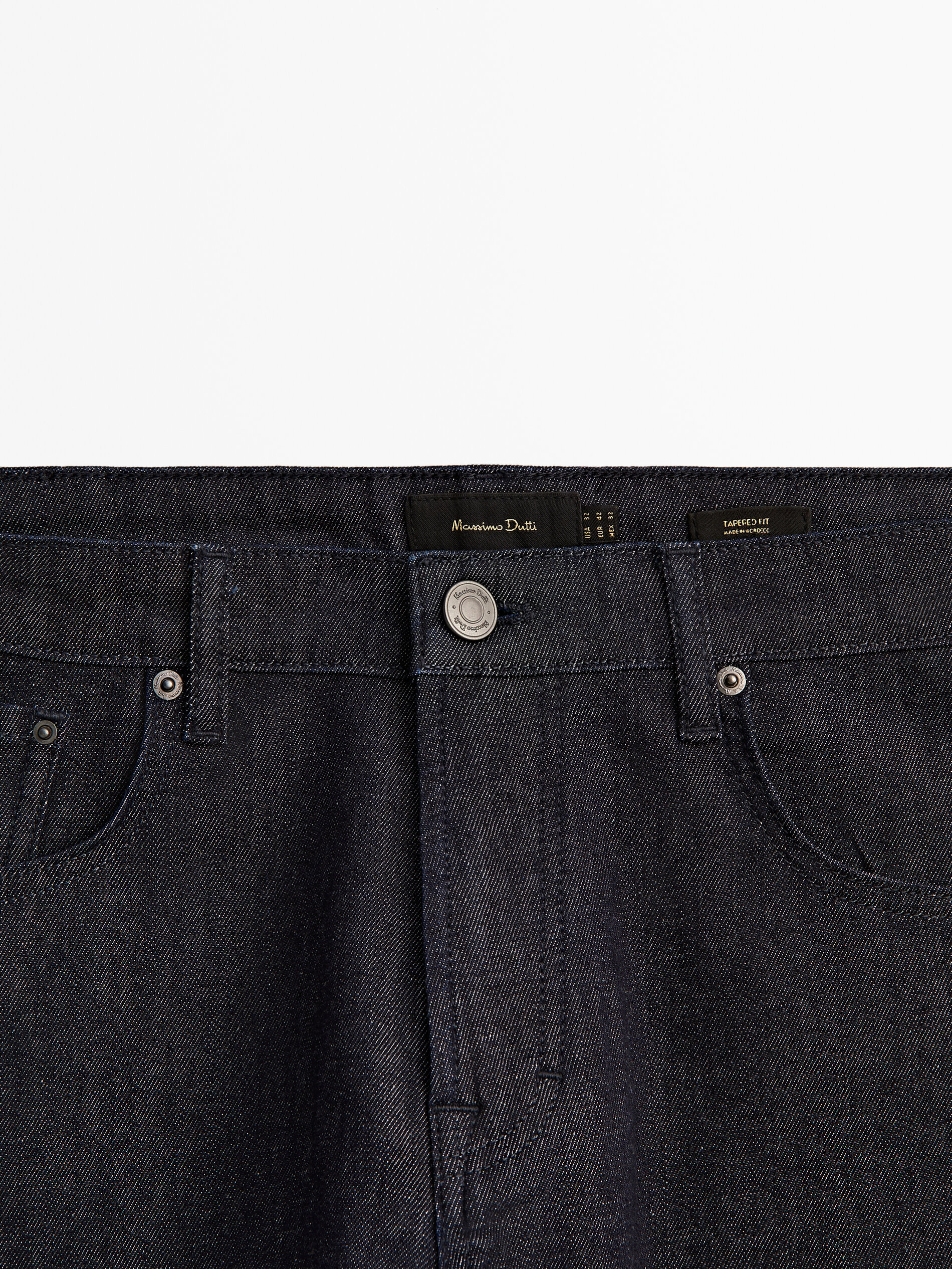 Pantalón vaquero desencolado tapered fit - INDIGO