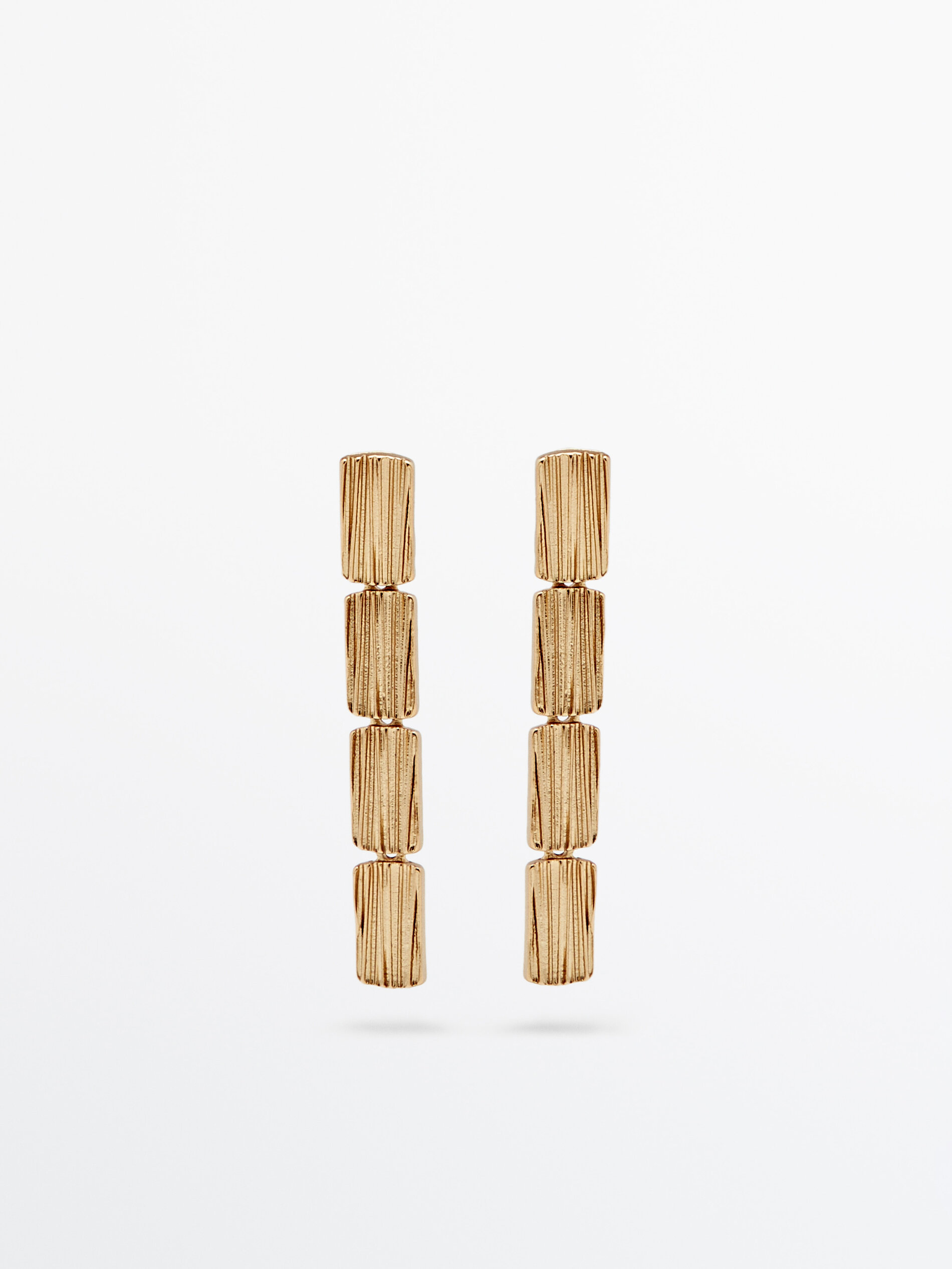 Pendientes largos textura baño oro - DORADO