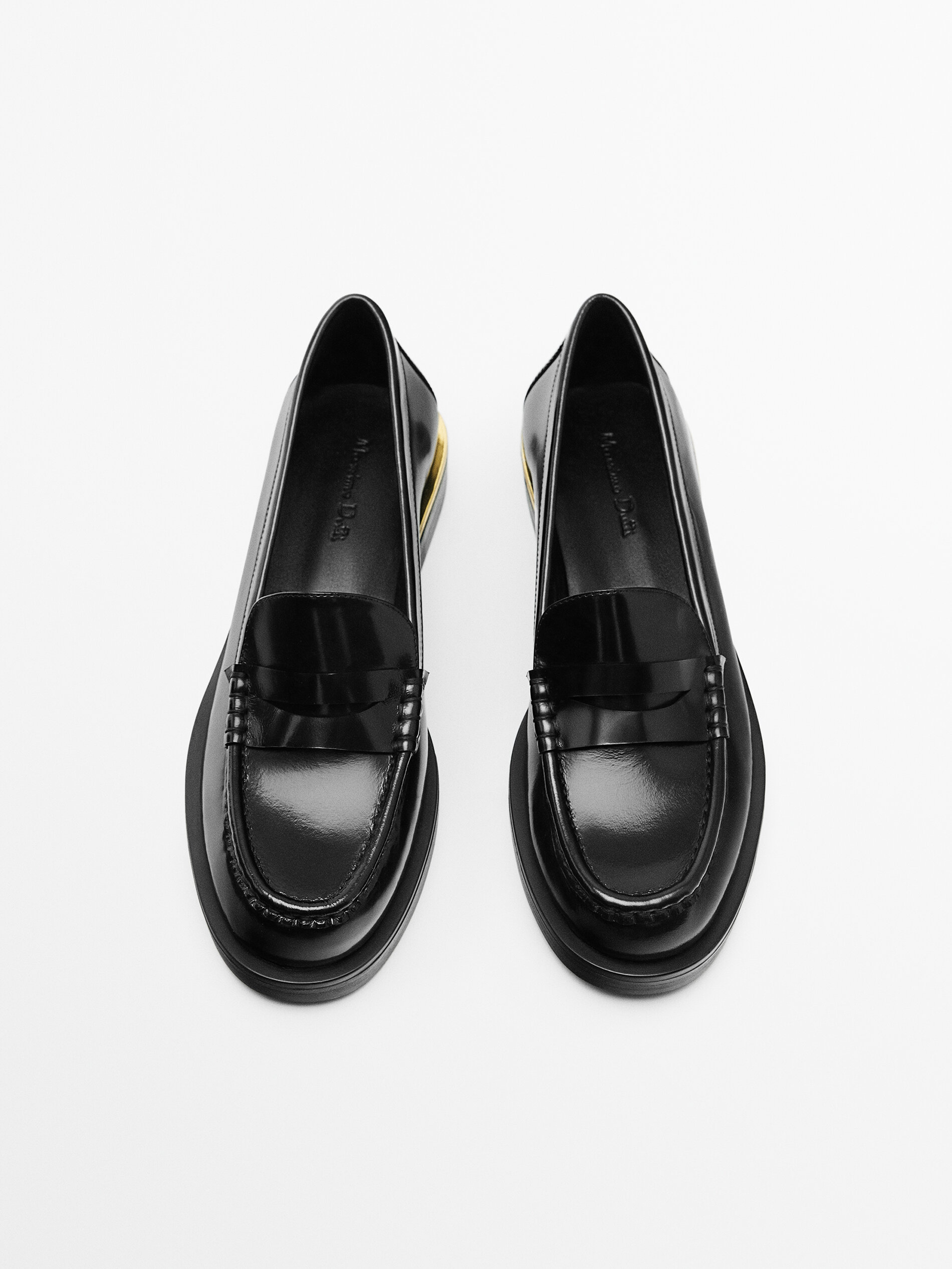 Mocasín piel pieza metálica talón - NEGRO