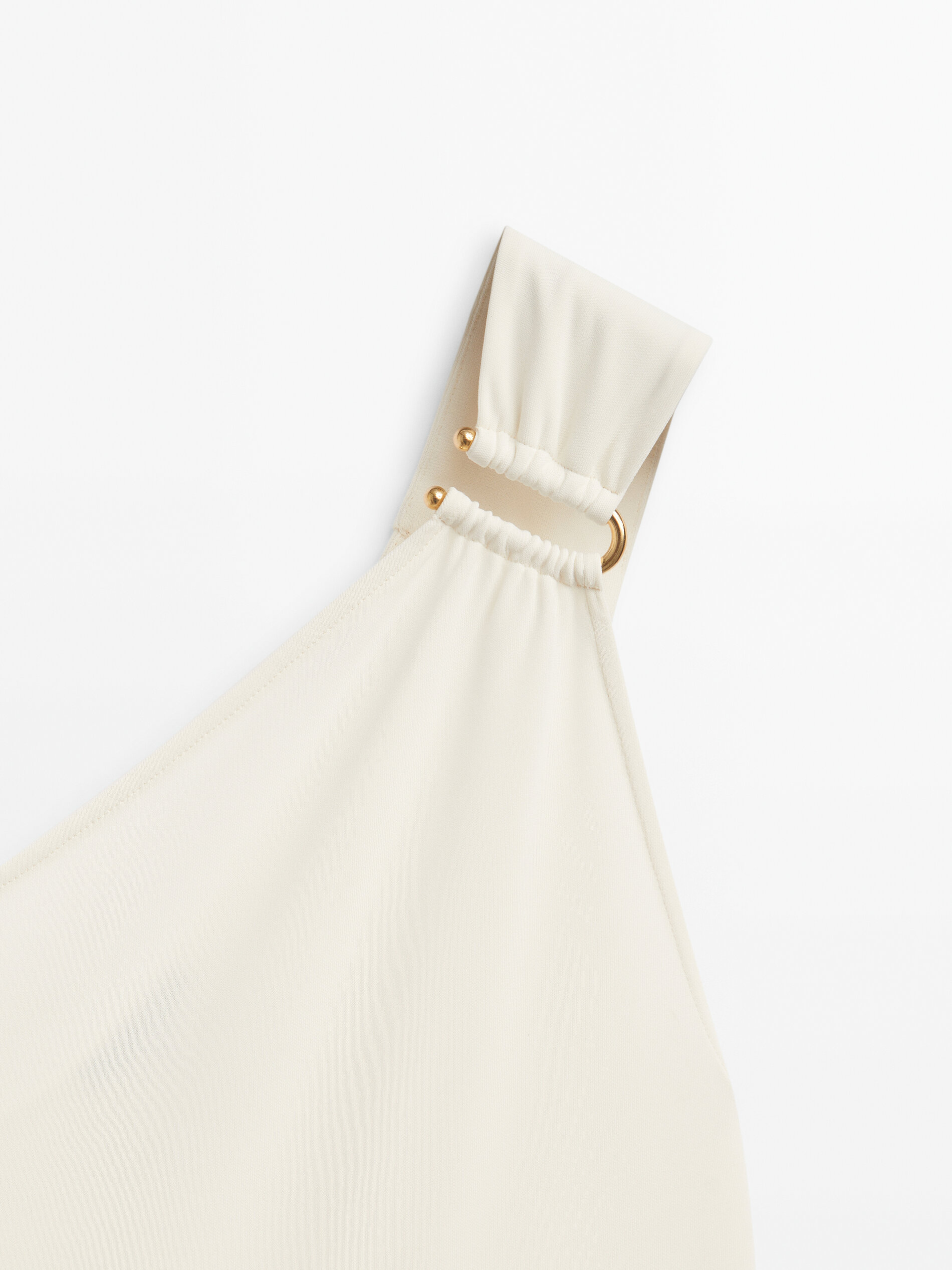 Top asimétrico detalle pieza dorada - CRUDO