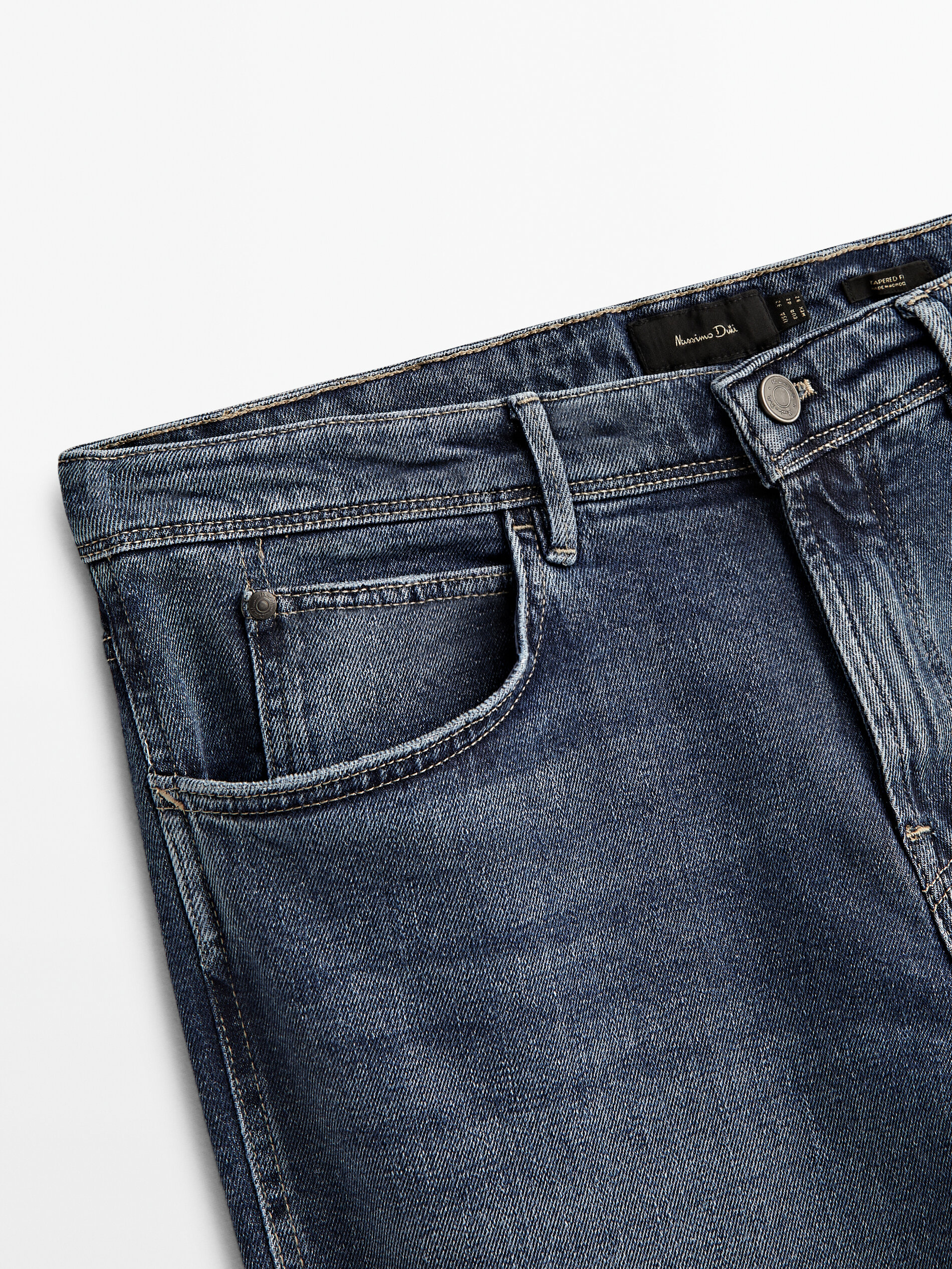 Pantalón vaquero stone wash tapered fit - INDIGO