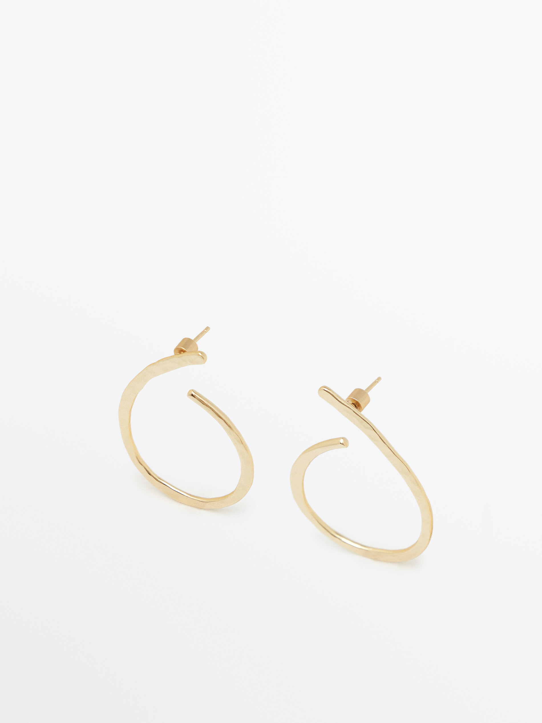 Pendientes aros ovalados textura baño oro - DORADO