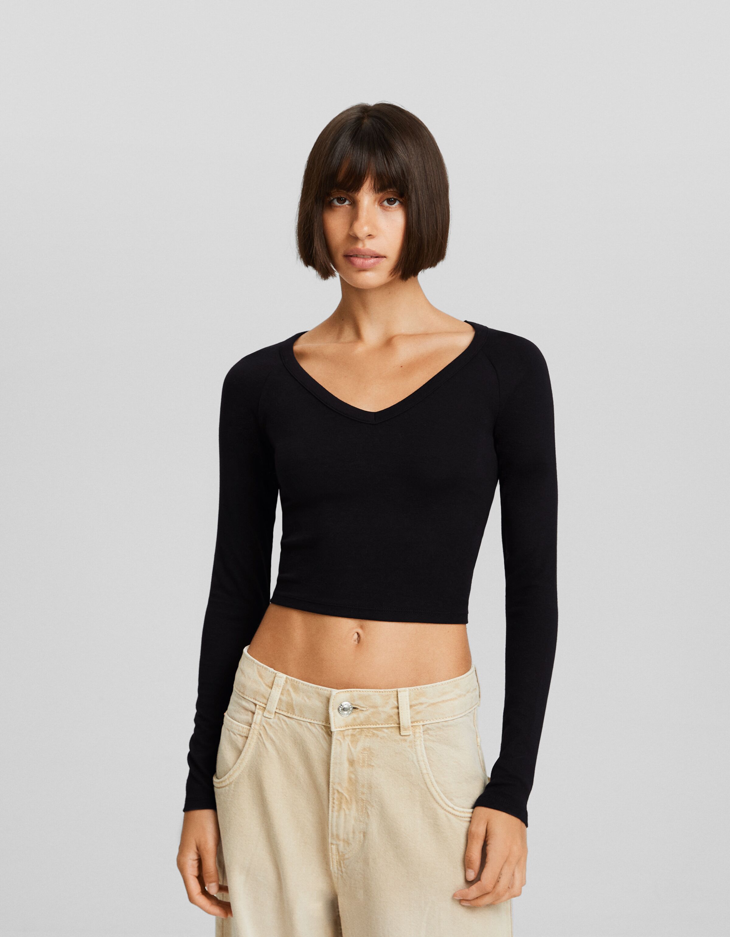 Camiseta manga larga cuello pico